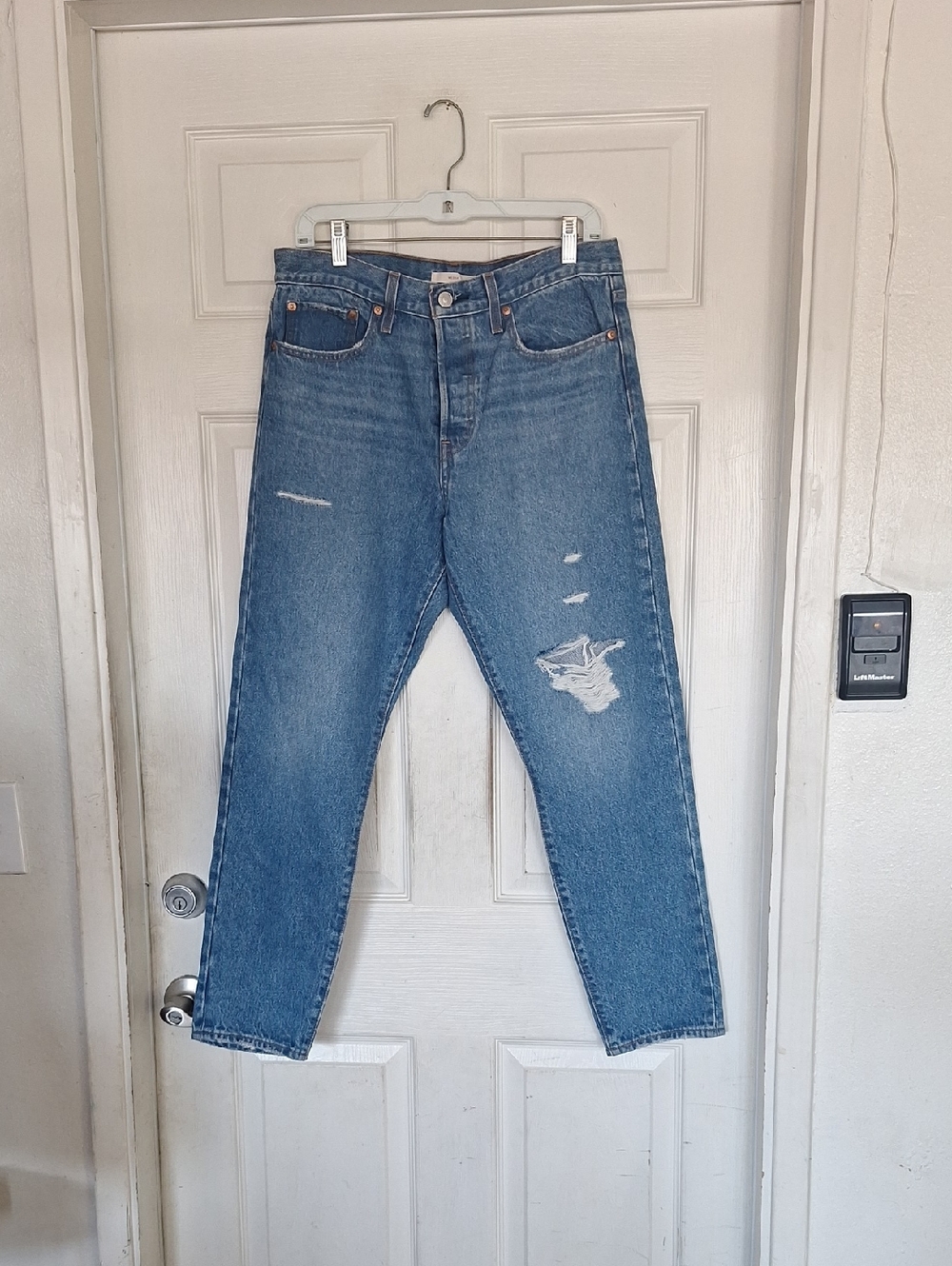 Levi's Blue Straight Leg Women's Jeans with Distressed Detail